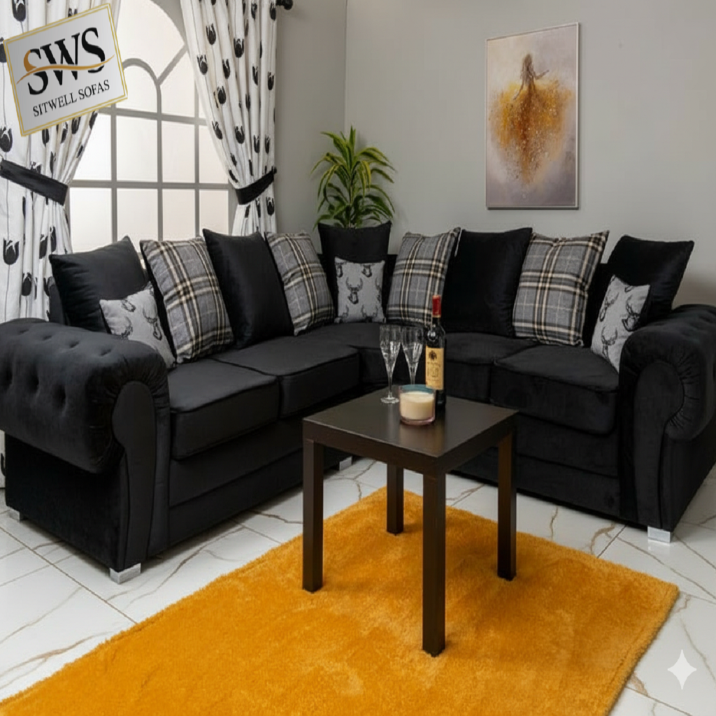 Black sectional sofa with plaid cushions in a living room setting, featuring a 'SWS' sign.
